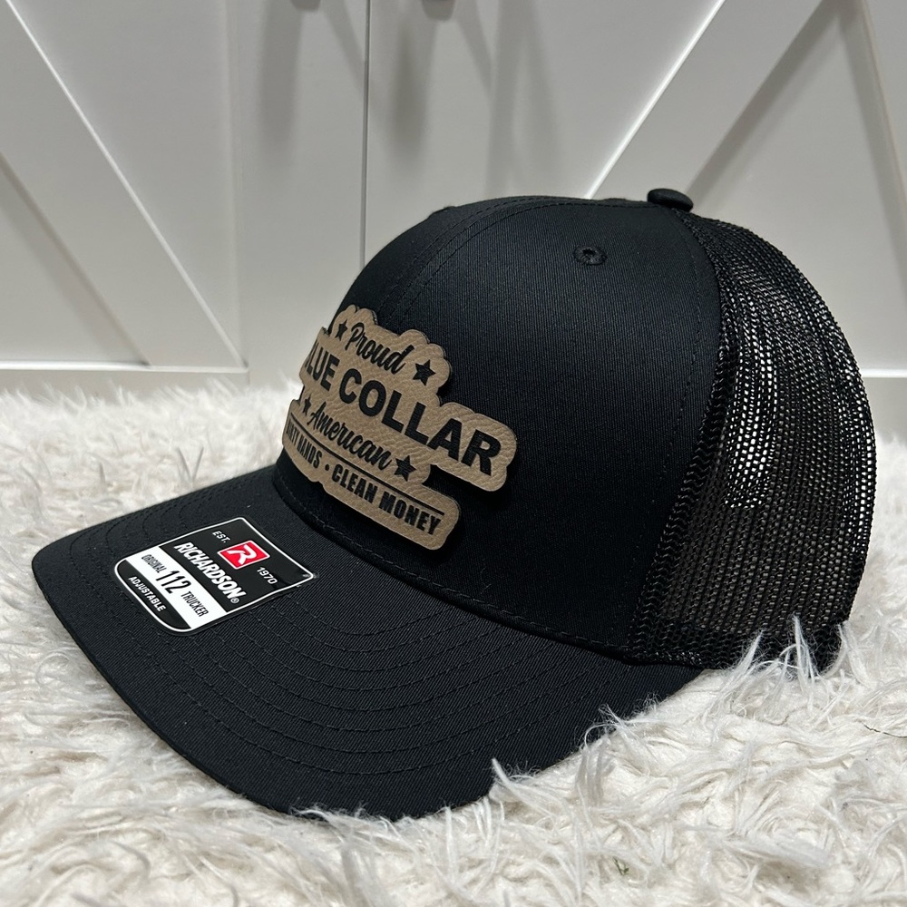 Proud blue collar American. Laser engraved Richardson 112 trucker hat.
